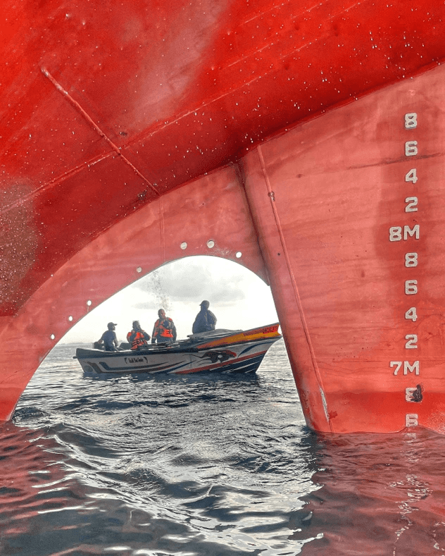 Marine engineer inspecting hull damage